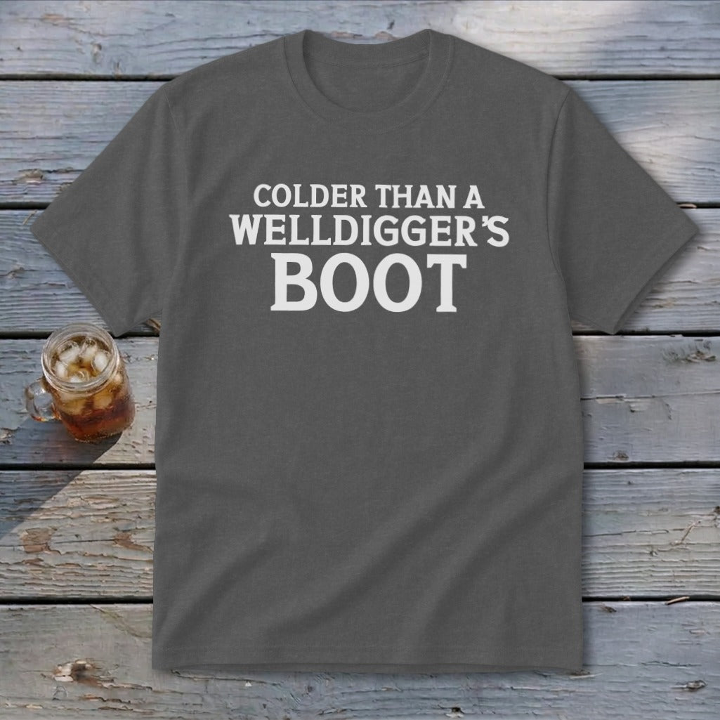 Dark grey t-shirt with white text "Colder Than A Welldigger's Boot".