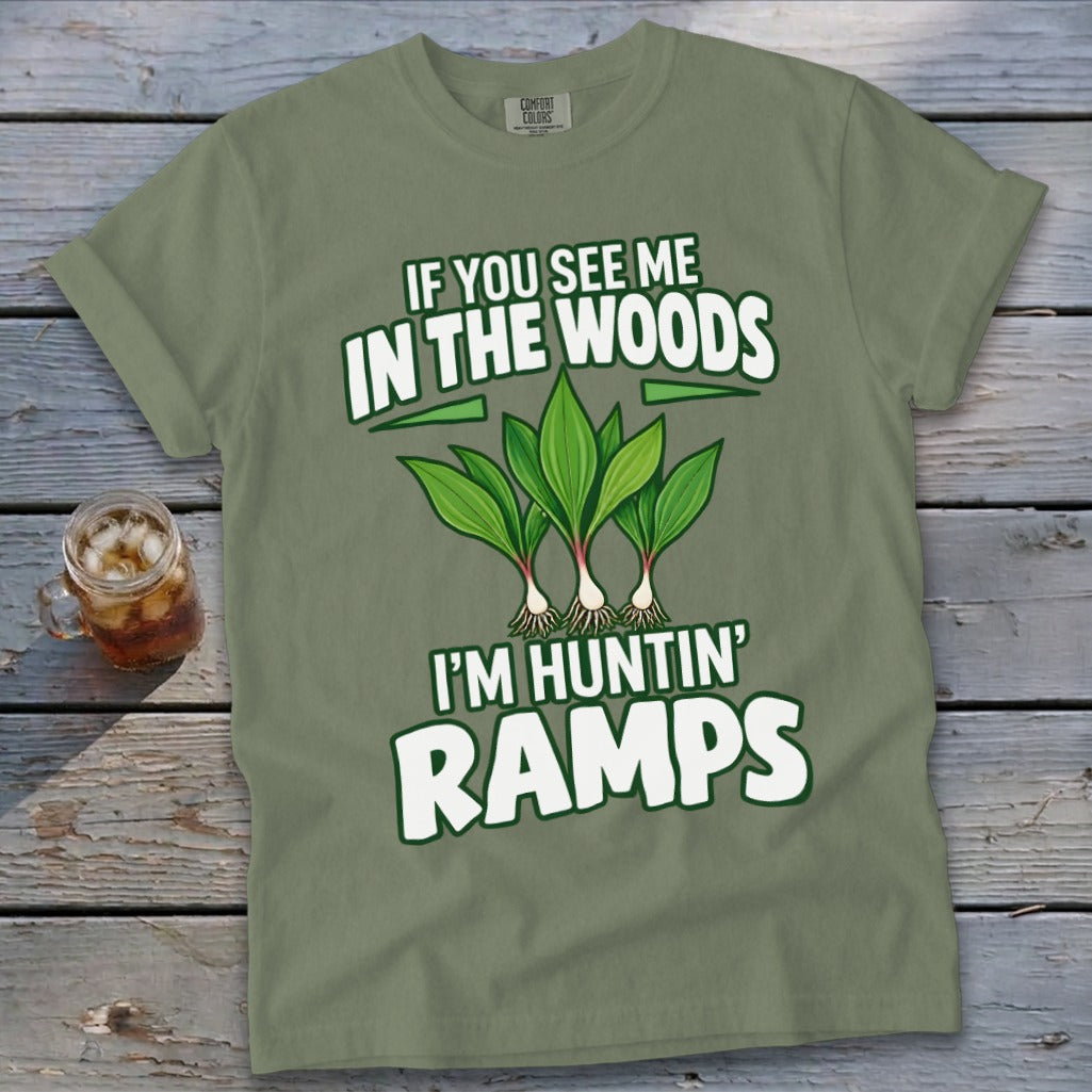 Sage green t-shirt with text reading IF YOU SEE ME IN THE WOODS I'M HUNTIN' RAMPS and an illustration of ramps.