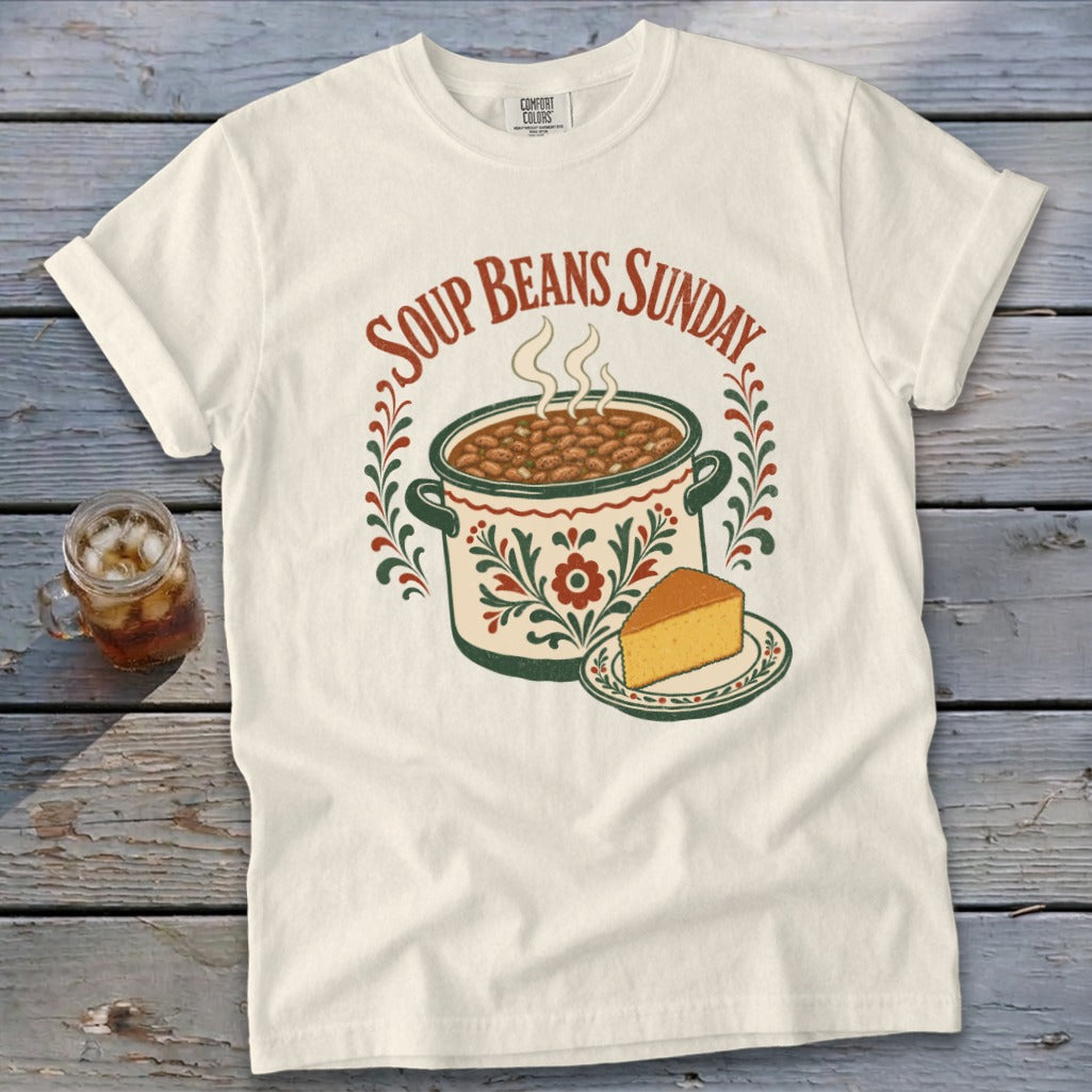 White t-shirt with "Soup Beans Sunday" graphic featuring a pot of beans and cornbread slice.