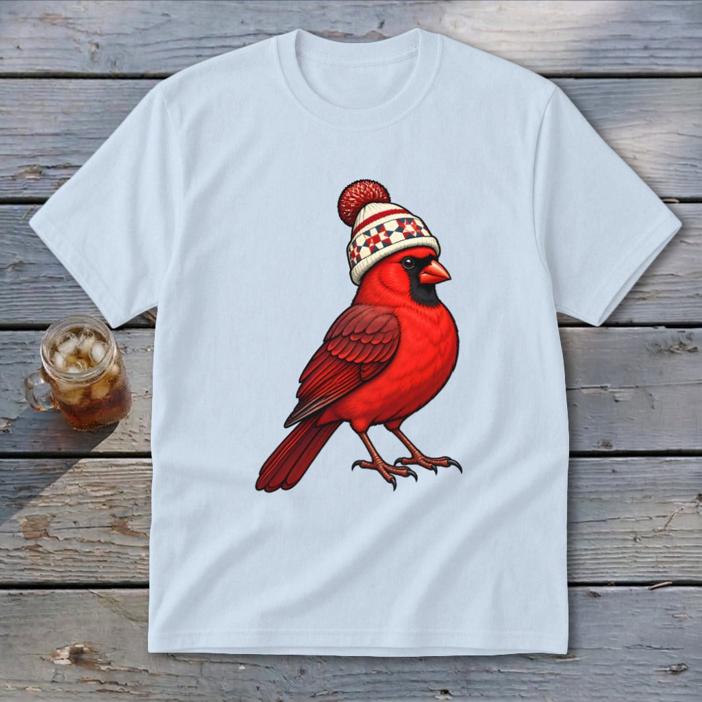 A light blue t-shirt displays a graphic of a red cardinal wearing a patterned winter hat.