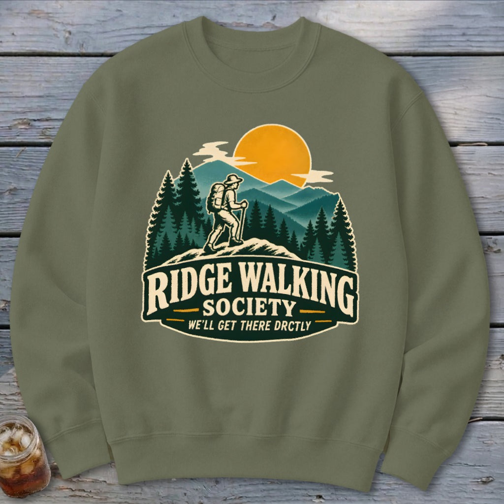 Olive sweatshirt with "Ridge Walking Society" graphic featuring a hiker and mountains.