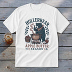 Bear making apple butter with "Hollerbear Apple Butter Season" text.