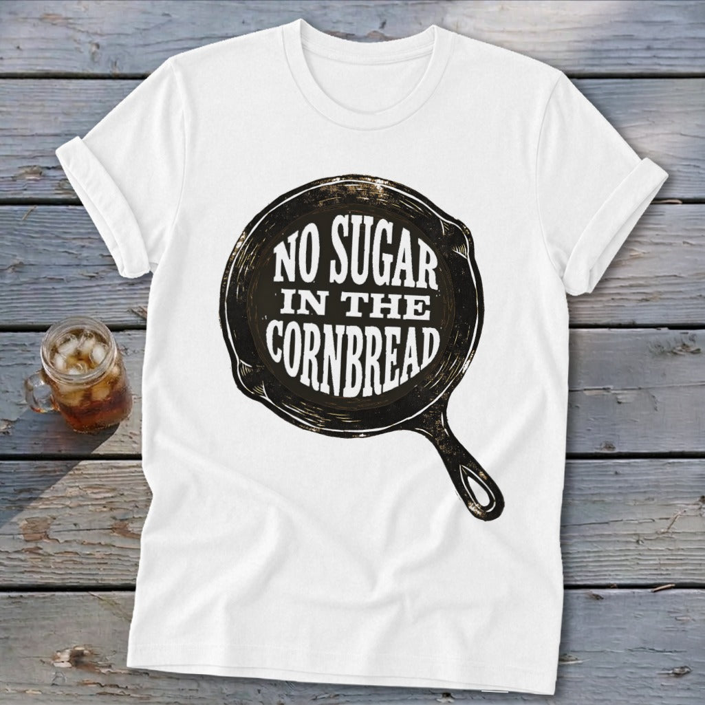 White t-shirt with a cast iron skillet graphic that reads "No Sugar in the Cornbread".