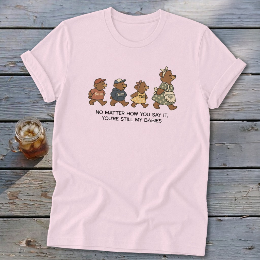 Pink t-shirt with four teddy bears walking and text "NO MATTER HOW YOU SAY IT, YOU'RE STILL MY BABIES."