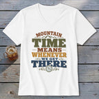 White t-shirt with "Mountain Time Means Whenever We Get There" graphic and clock detail.