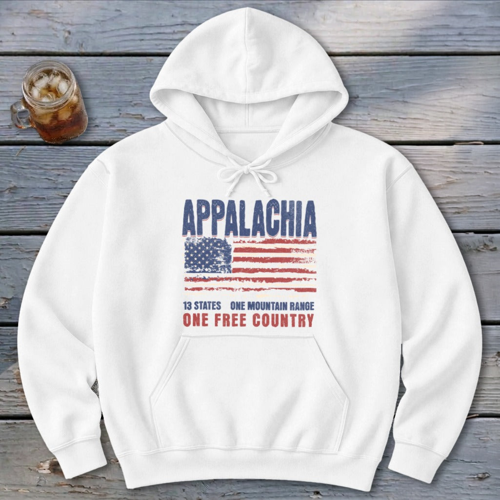 White pullover hoodie featuring a distressed American flag graphic, the word APPALACHIA, and text reading ONE FREE COUNTRY.
