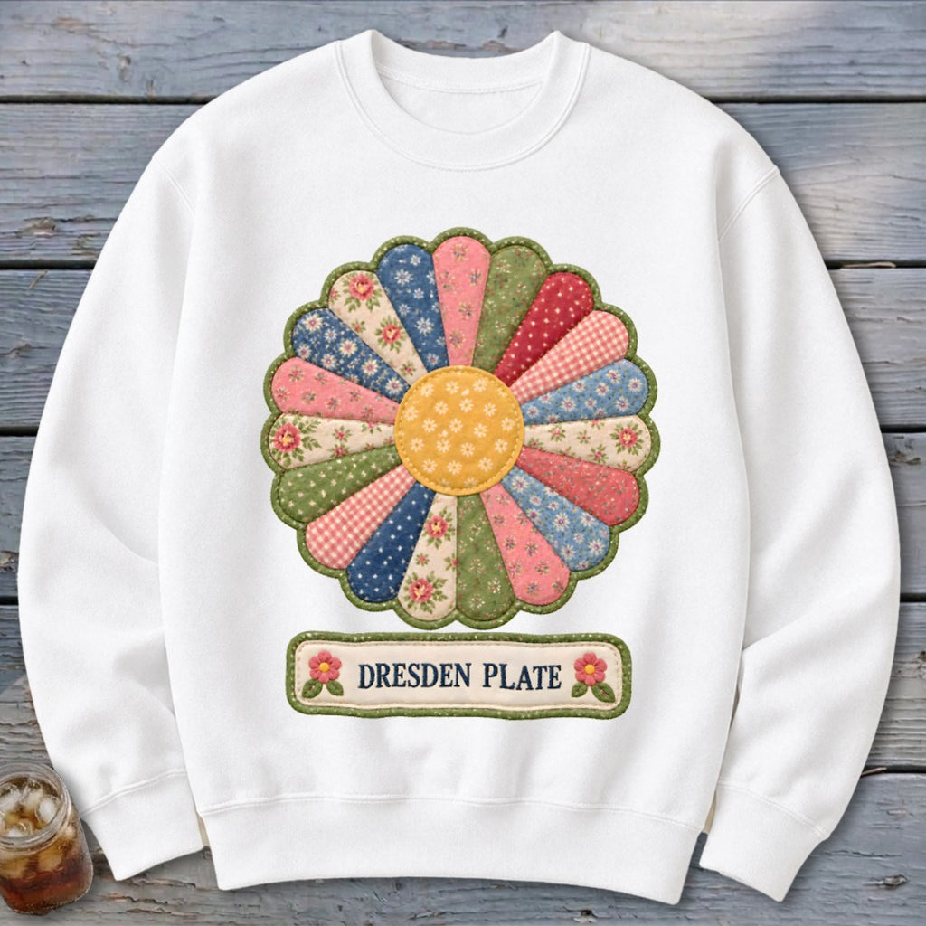 White sweatshirt with a quilted Dresden Plate flower design and "DRESDEN PLATE" text.