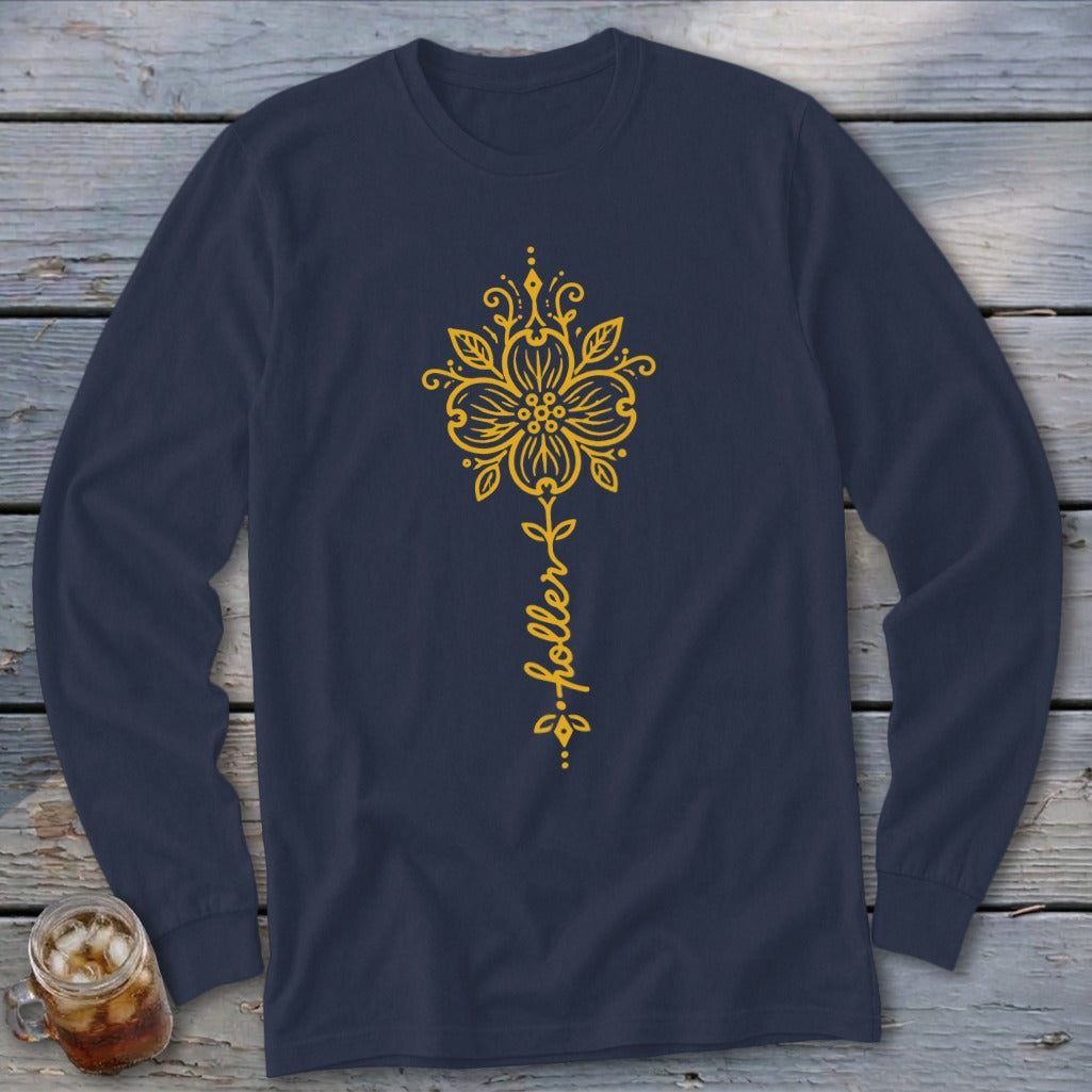 Navy long-sleeve shirt with a yellow floral design and the word "holler" vertically.