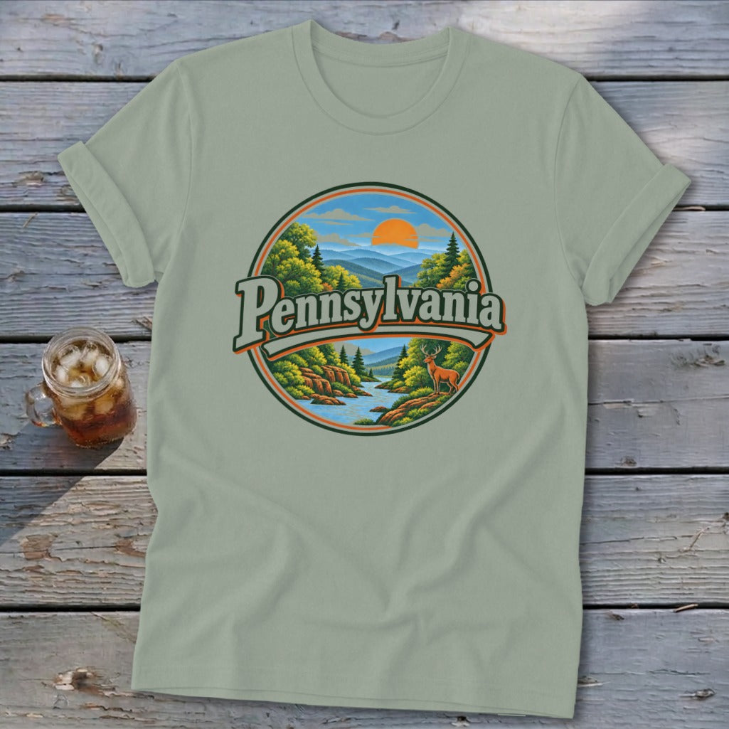 Pennsylvania t-shirt with a circular landscape graphic featuring a river, deer, and mountains.