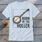 Light blue t-shirt with banjo graphic and text "BORN IN THE HOLLER".