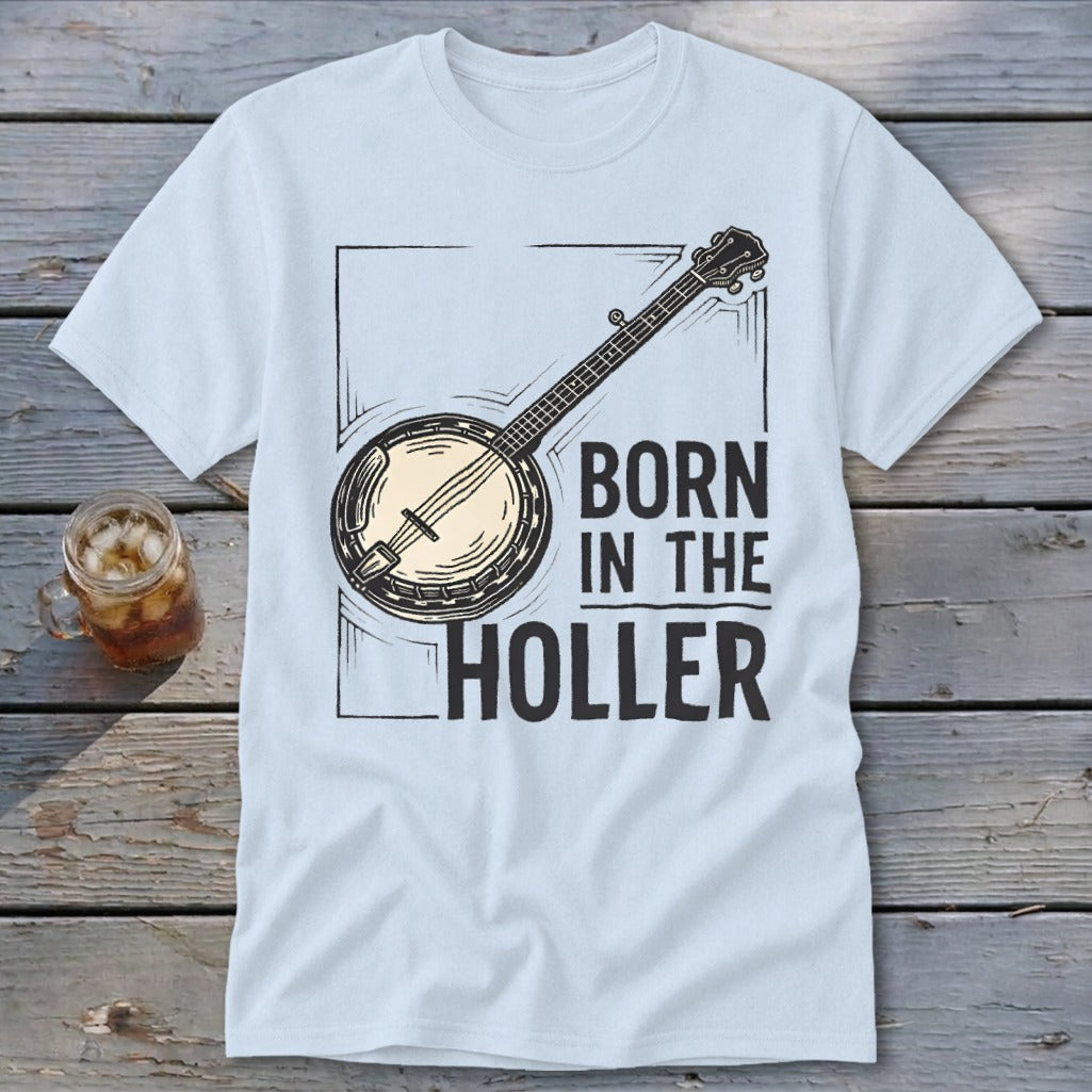 Light blue t-shirt with banjo graphic and text "BORN IN THE HOLLER".