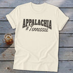 Cream t-shirt with "Appalachia #Tennessee" graphic on a wooden background.