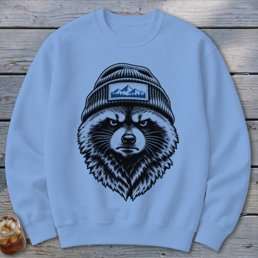 Light blue crewneck sweatshirt featuring a black and white graphic of a raccoon wearing a beanie.