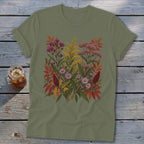 Olive green t-shirt with an intricate floral illustration in autumnal colors.