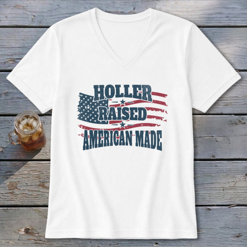 White v-neck t-shirt with distressed American flag graphic and text.
