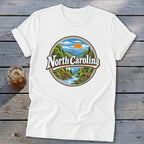 White t-shirt with circular North Carolina nature graphic and deer.