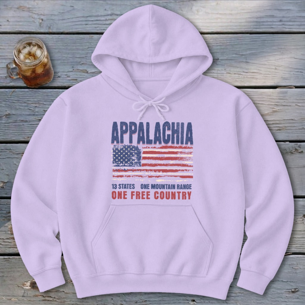 A light purple hooded sweatshirt with front pocket featuring a distressed American flag graphic, Appalachia text, and text reading 13 states one mountain range one free country.