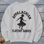 A white crewneck sweatshirt featuring a black graphic of a dancing woman and Appalachian flatfoot dancer text.