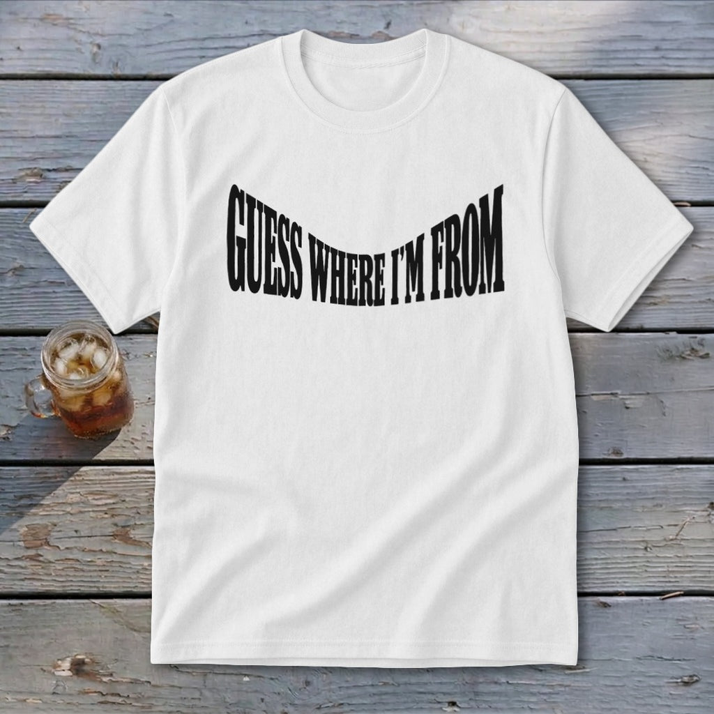White t-shirt with black text that reads "GUESS WHERE I'M FROM" in a wavy font.