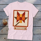 Pink t-shirt featuring a quilt-style maple leaf design and "MAPLE LEAF" text.