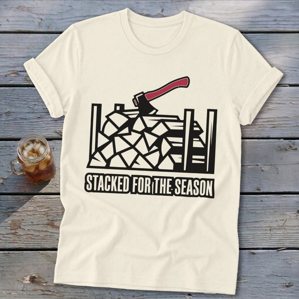 Cream t-shirt with woodpile graphic and "Stacked for the Season" text.