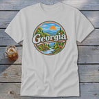 White t-shirt with circular Georgia mountain landscape graphic featuring a deer.