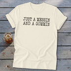 Cream t-shirt with black text reading "JUST A MESSIN AND A GOMMIN".