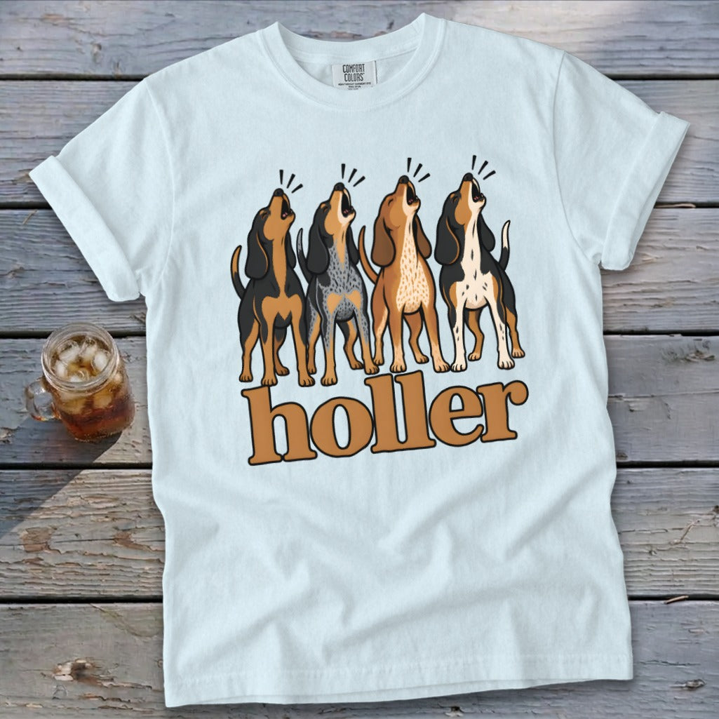 White t-shirt with four howling dogs and "holler" text graphic.