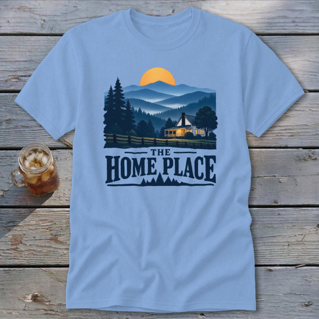 Light blue t-shirt with "The Home Place" text and a mountain landscape graphic.