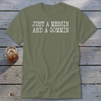 Olive t-shirt with white text "JUST A MESSIN AND A GOMMIN".
