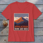 A red V-neck t-shirt featuring a mountain graphic and the text APPALACHIAN BORN AND BRED.