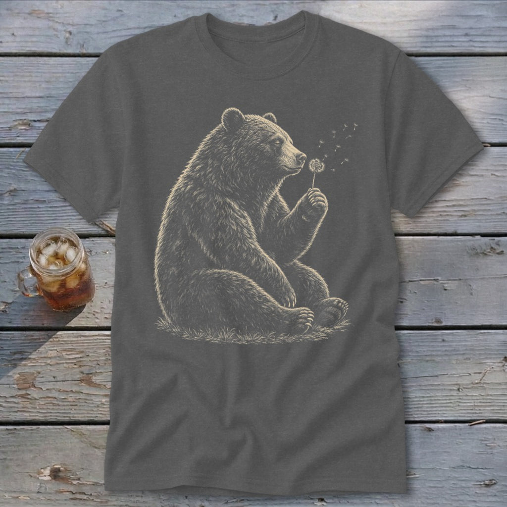 Bear sitting and blowing on a dandelion on a dark grey t-shirt.