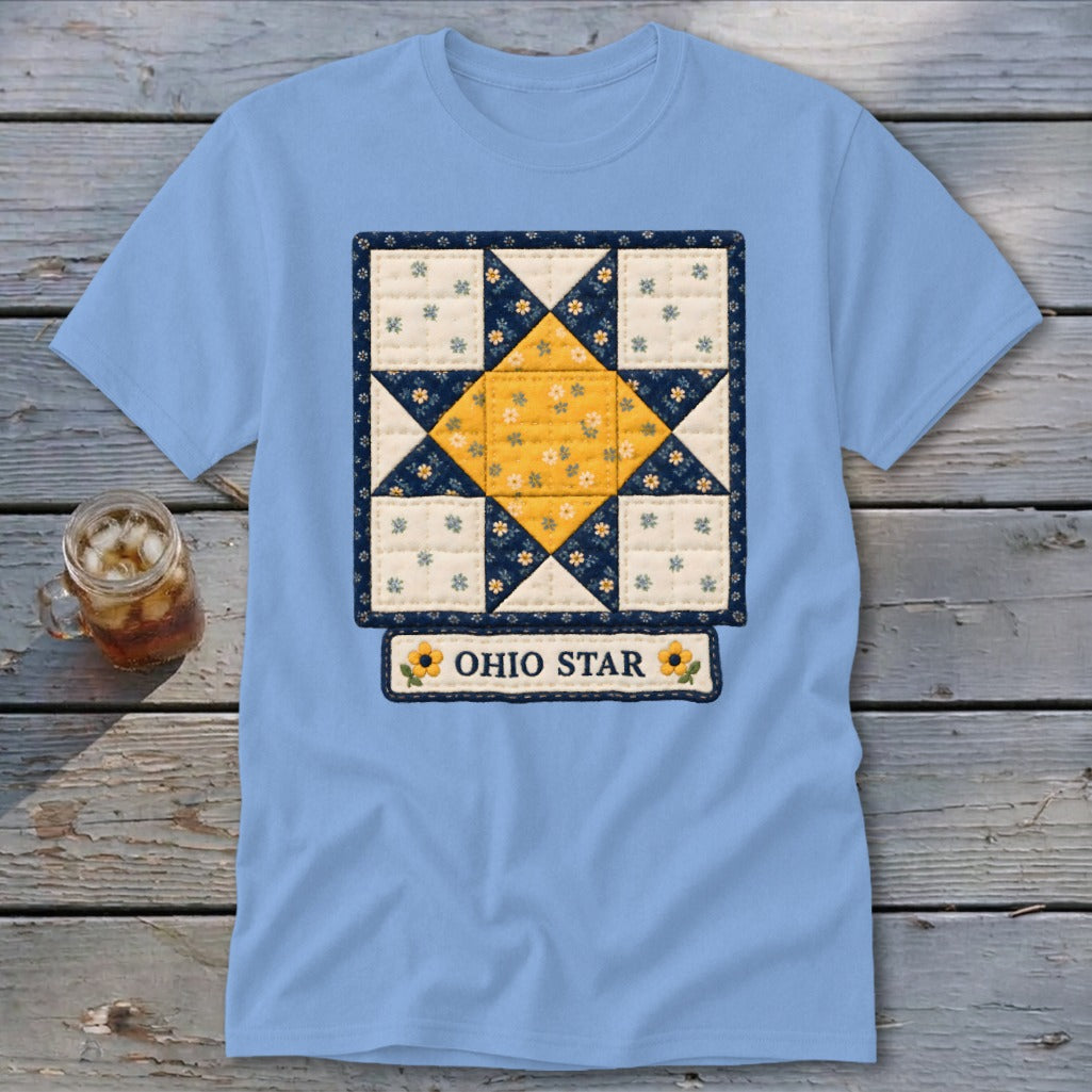 Light blue t-shirt with a quilted Ohio Star design and sunflowers.