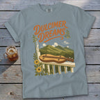 Dulicmer Dreams graphic on a pale blue t-shirt with dulcimer, mountains, and flowers.