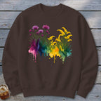Brown sweatshirt with watercolor purple and yellow wildflowers and colorful paint splatters.