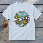 White t-shirt with circular graphic featuring "North Carolina" and a mountain landscape.
