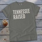 Gray Comfort Colors t-shirt with "TENNESSEE RAISED" text in white.