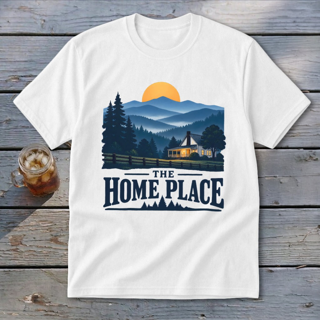 White t-shirt graphic: lit house, mountains, sunset, and "The Home Place" text.