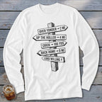 A white long-sleeved t-shirt featuring a black graphic of a wooden signpost with directional distance text.