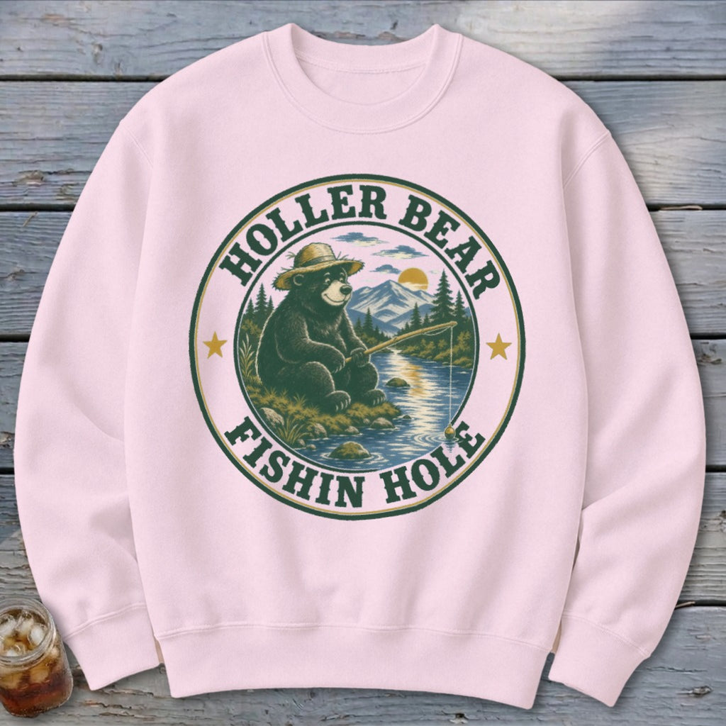 Pink sweatshirt with a circular graphic of a bear fishing and text "Holler Bear Fishin Hole".