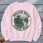 Pink sweatshirt with a circular graphic of a bear fishing and text "Holler Bear Fishin Hole".