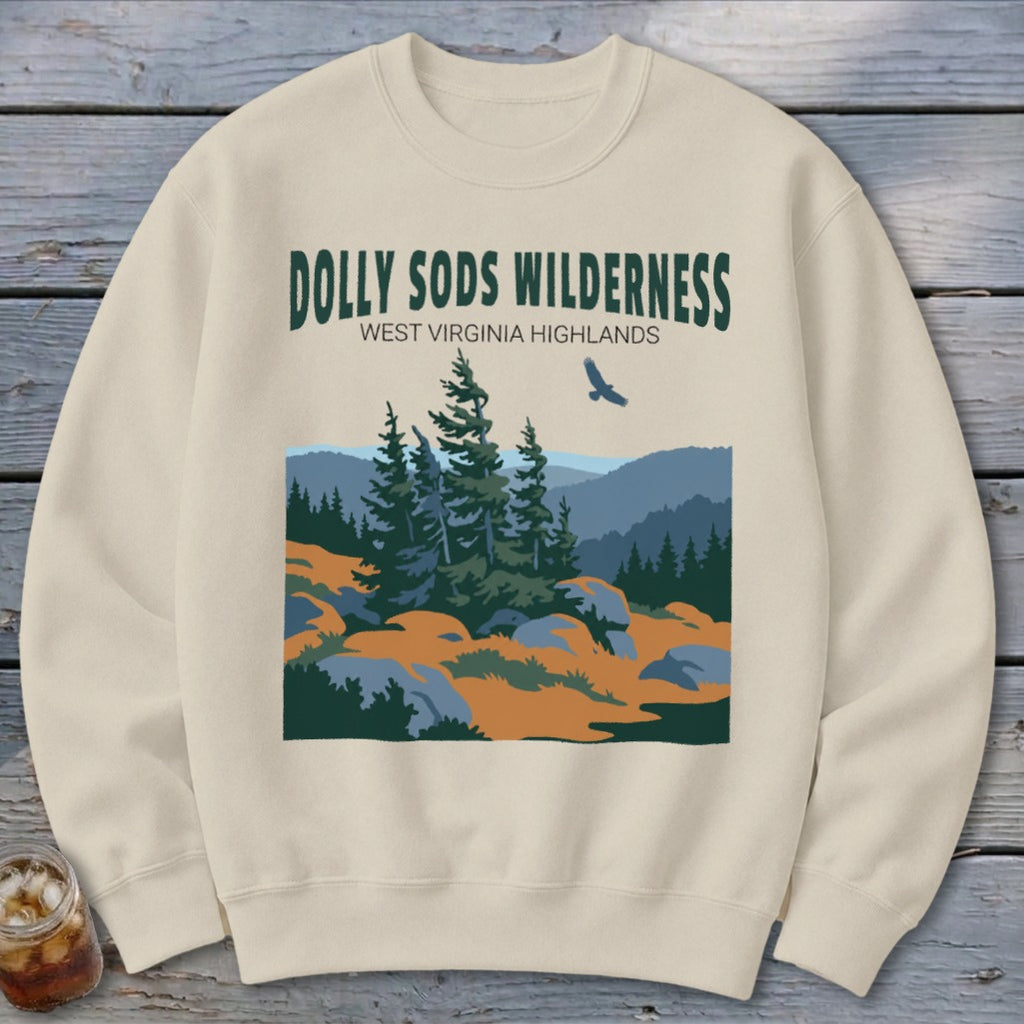 Cream crewneck sweatshirt featuring a graphic of Dolly Sods Wilderness with pine trees and mountains.