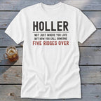 White t-shirt with "HOLLER NOT JUST WHERE YOU LIVE BUT HOW YOU CALL SOMEONE FIVE RIDGES OVER" text.