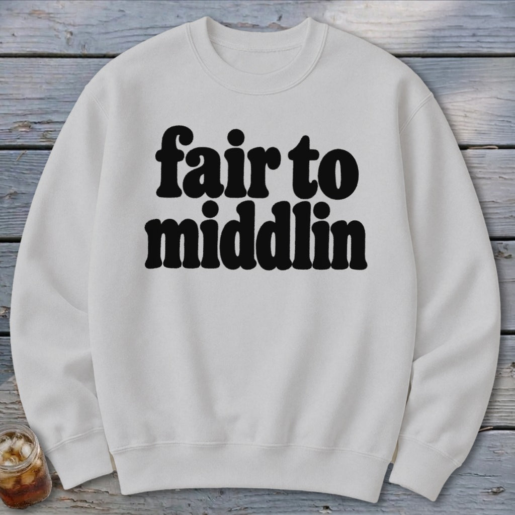 White sweatshirt with black text reading "fair to middlin'".