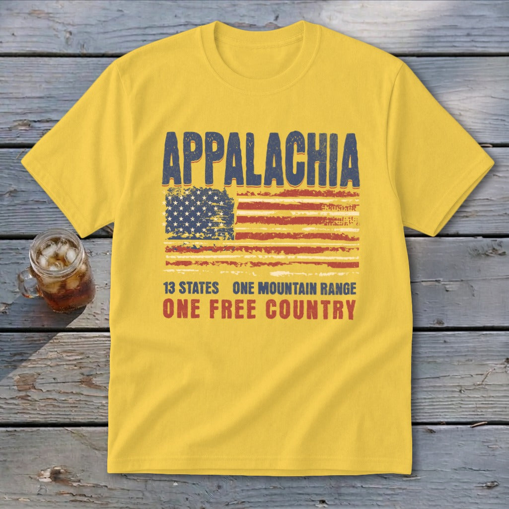 A yellow t-shirt features a distressed graphic with the text Appalachia, a stylized American flag, and the phrase 13 States, One Mountain Range, One Free Country.