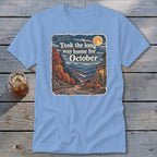 Light blue t-shirt graphic with "Took the long way home for October" text and autumn mountain scene.