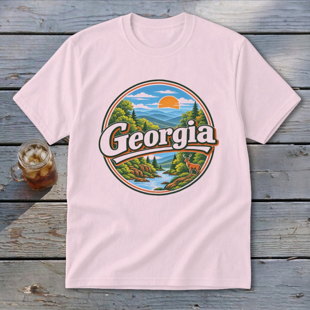 Pink t-shirt with circular Georgia mountain landscape graphic and a deer.