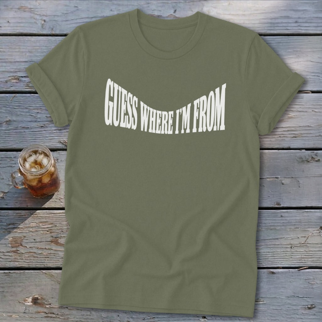 Olive t-shirt with "GUESS WHERE I'M FROM" in white distressed lettering.