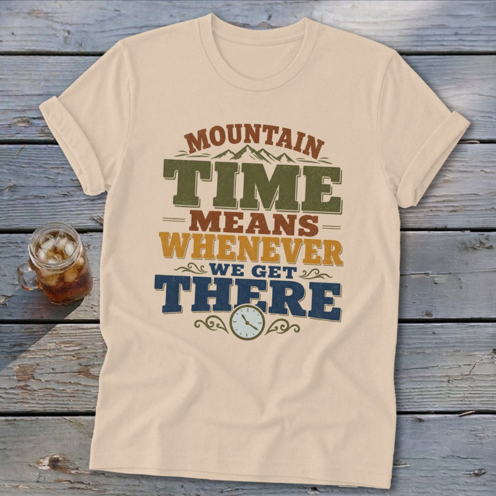 Cream t-shirt with "Mountain Time Means Whenever We Get There" text and clock graphic.