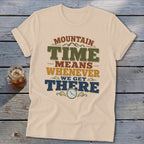 Cream t-shirt with "Mountain Time Means Whenever We Get There" text and clock graphic.